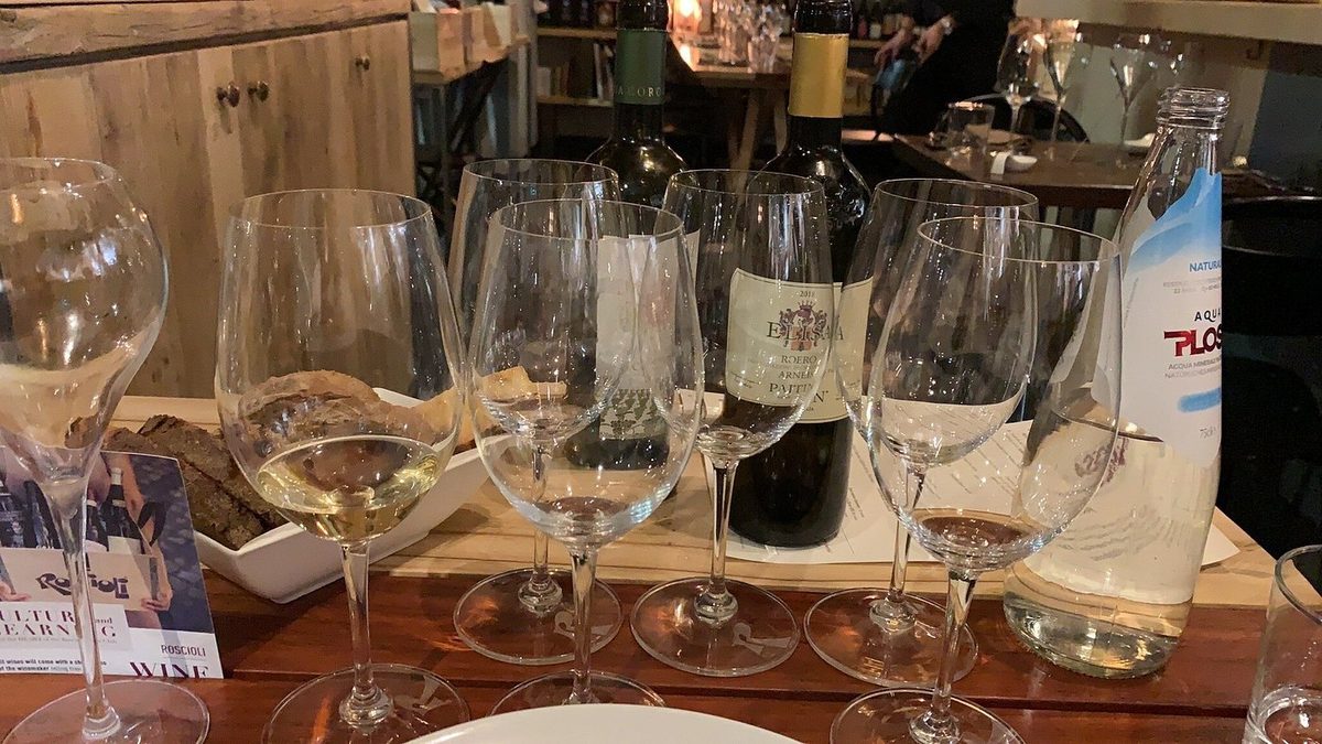 Glasses and gift pouches on a tasting table