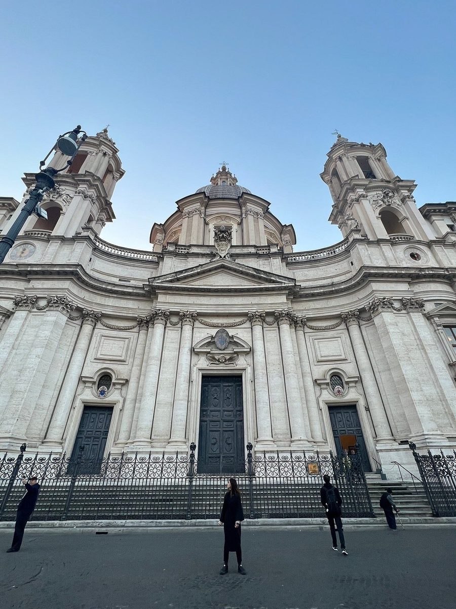 A baroque church facade with two bell towers