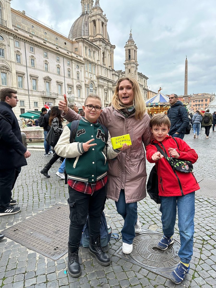 Adults with children in Piazza Navona