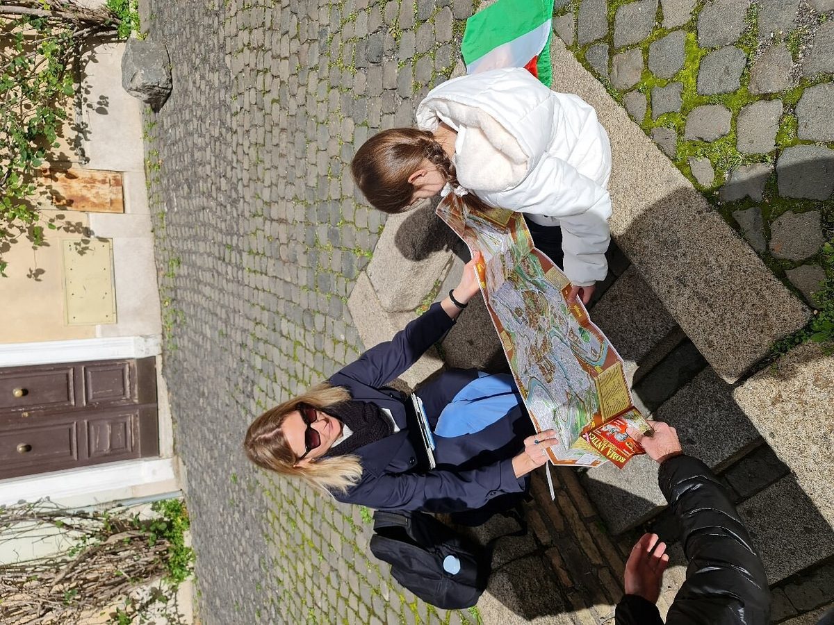 Children and adults over the quest map, shot from above