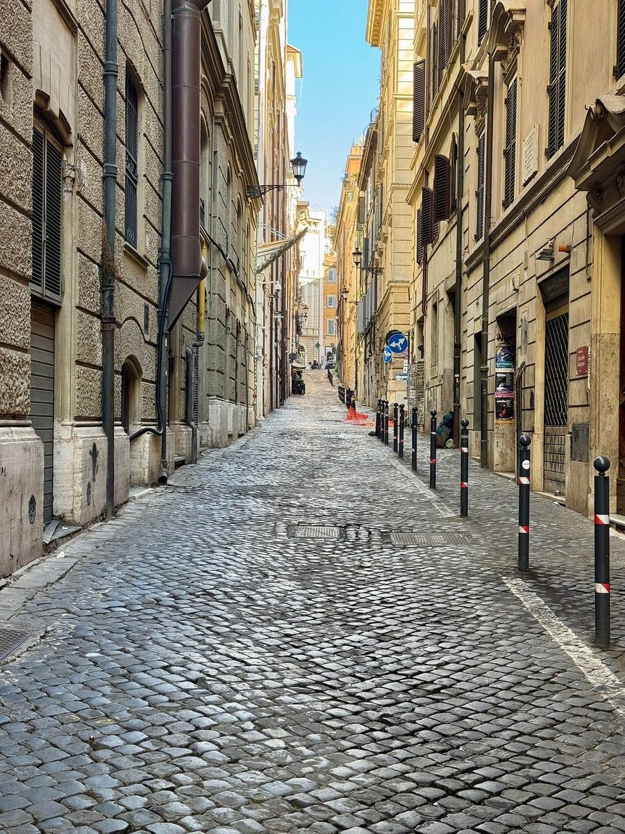 A narrow cobbled street in Rome
