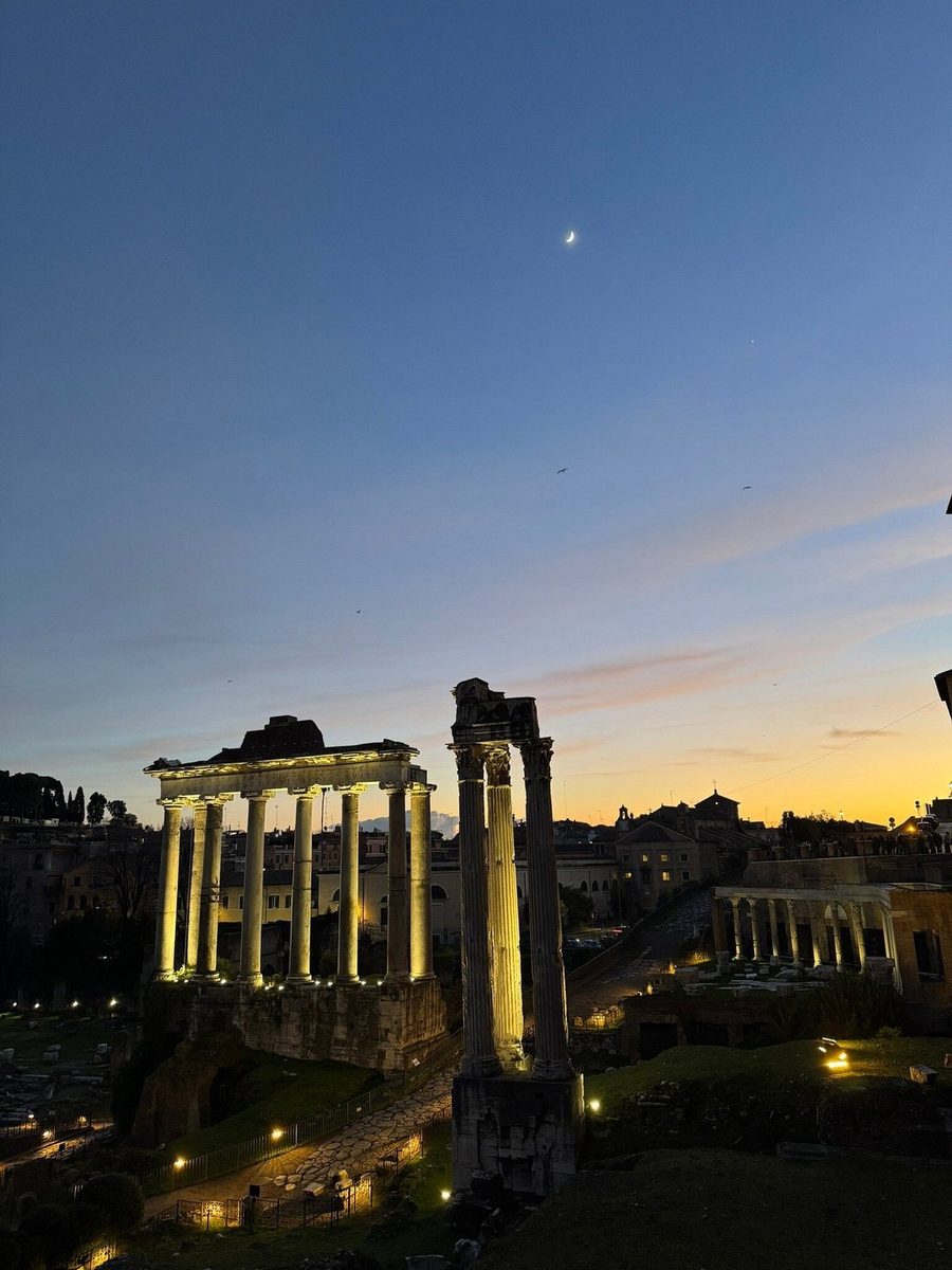 The Roman Forum at blue hour with the columns lit up